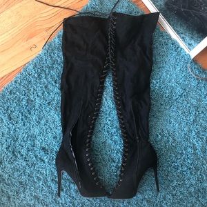 Over-the-knee lace up heeled boots